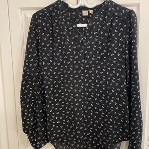 Twik from Simons polyester blouse. Cute paper plane design. Extra buttons.